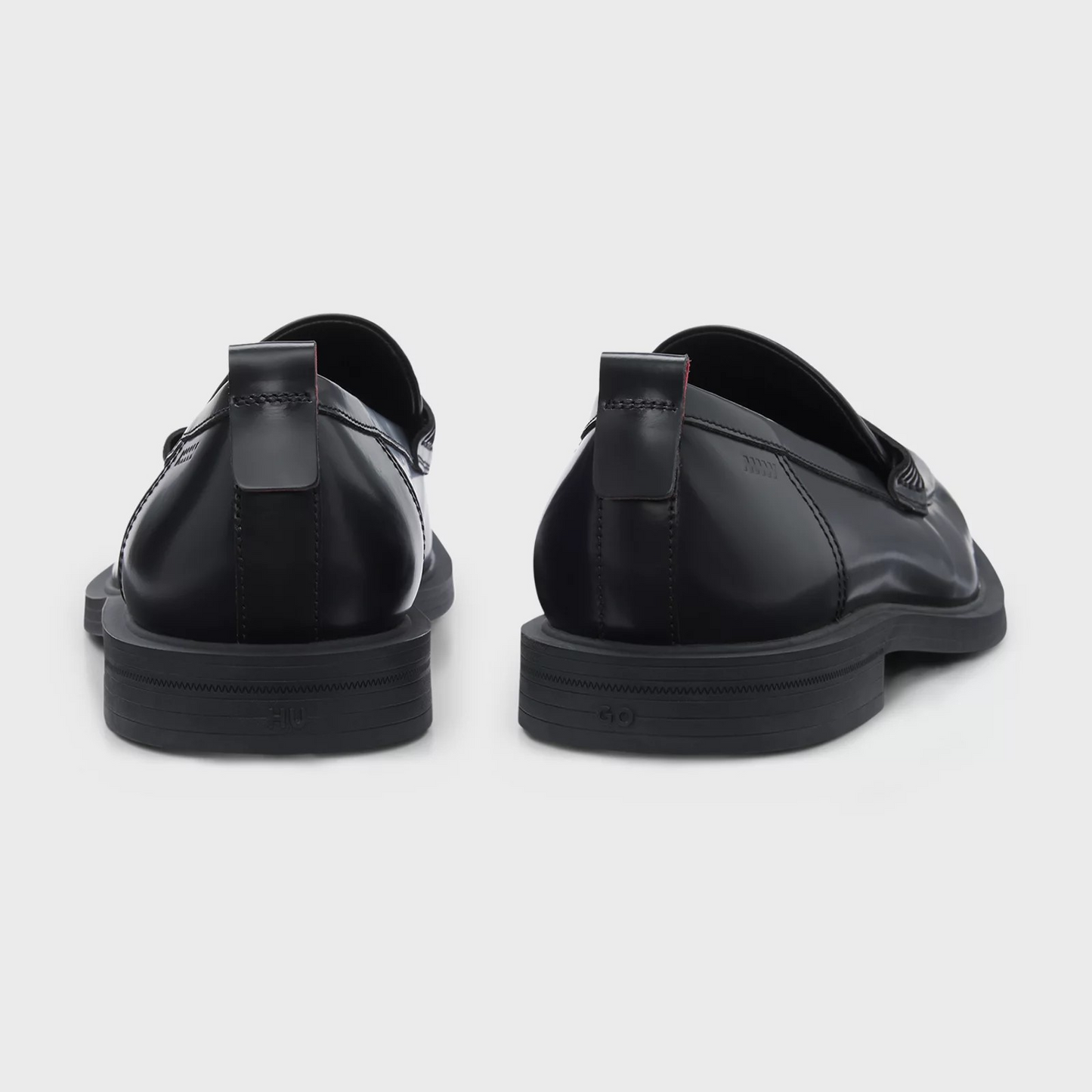 Dettaglio posteriore dei BOSS Mocassini Neri Pelle Made in Italy, evidenziando la qualità e il design raffinato.