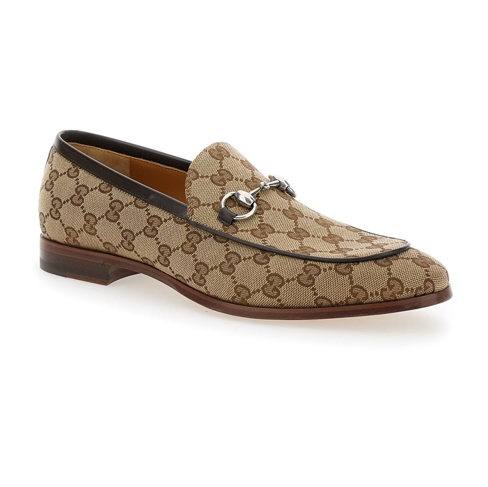 Mocassini Gucci eleganti 890G3D00Z100 in beige ed ebano con punta tonda e design raffinato.