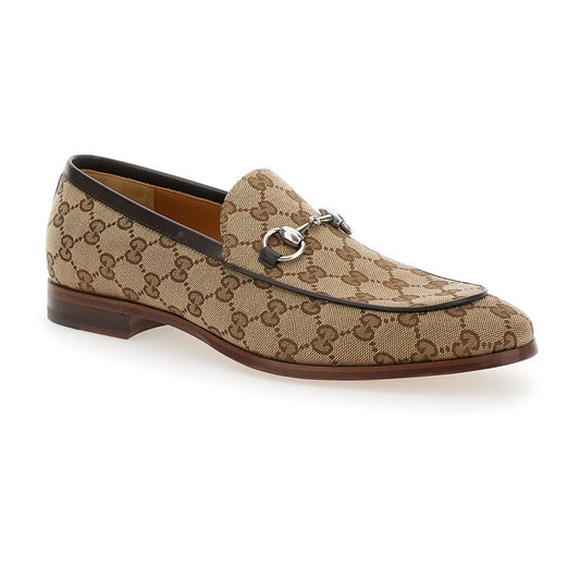 Mocassini Gucci eleganti 890G3D00Z100 in beige ed ebano con punta tonda e design raffinato.